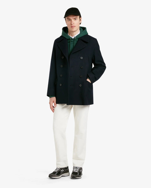 Men's Churchill Peacoat in Navy- 100% Melton Wool regular fit peacoat with pockets, on model with hand in pocket, on white background