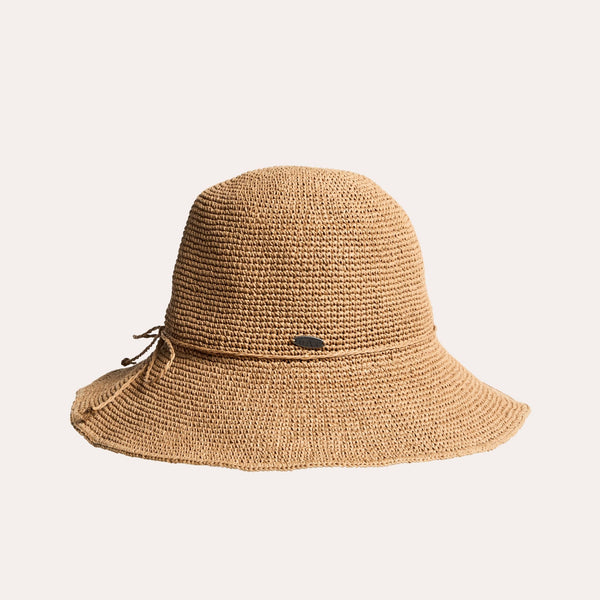 The Corinne fine paper straw crochet cloche hat in the Camel colour.