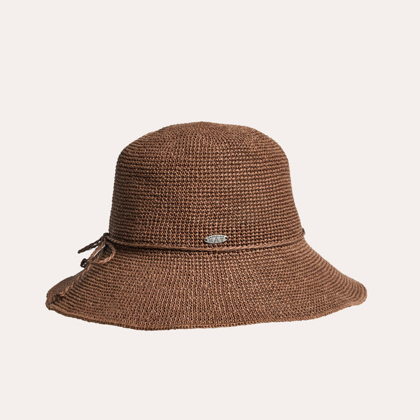 The Corinne fine paper straw crochet cloche hat in the brown colour.