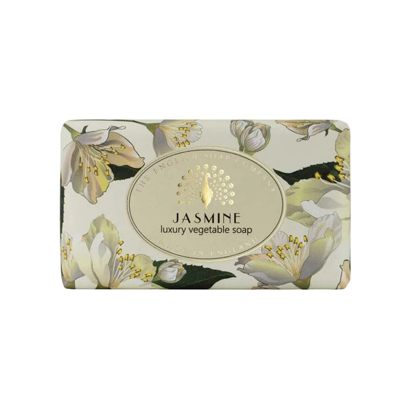 Bar of soap with floral design and 'Jasmine' branding on a beige background