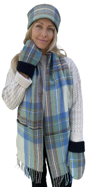 Model wearing Muted Blue Stewart woolen mits, hat and lambswool scarf