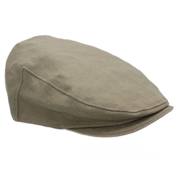 A sideview image of the flax coloured Irish linen flat cap with a white background.
