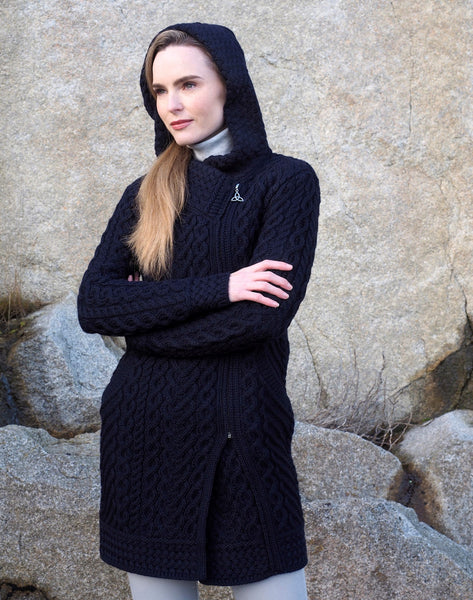Claddagh Cardigan in Oatmeal - 100% Merino Wool long Cardigan with hood and side zipper, 3/4 view on model