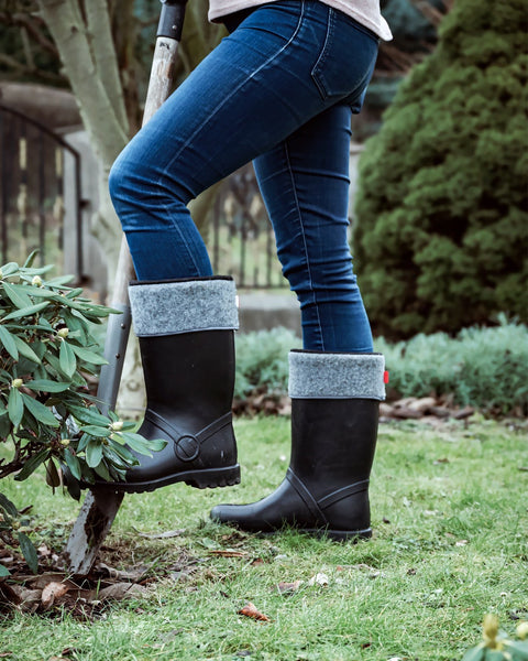 Person wearing and gardening with Ladies Lemigo Horse Boot