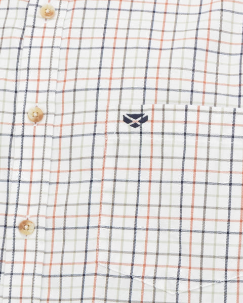 Up close view of the Inverness Cotton Tattersall Shirt with white background with navy rust tattersall stripes, and a close up view of the pocket and buttons.