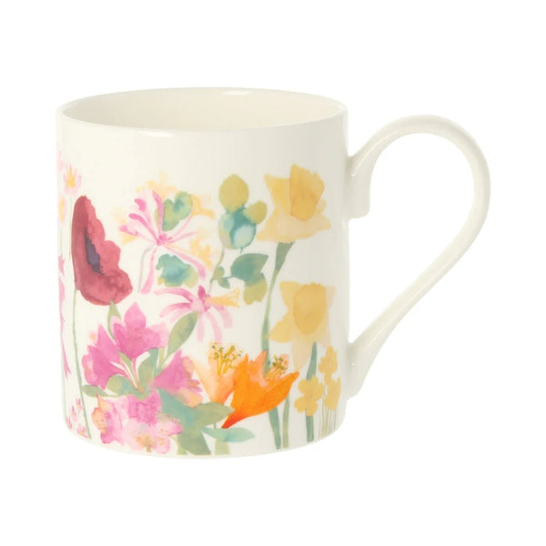 Floral mug with colorful flowers on a white background and called the Isolation Garden Mug