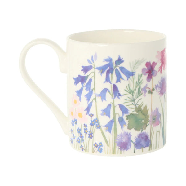 Floral mug with colorful flowers on a white background and called the Isolation Garden Mug