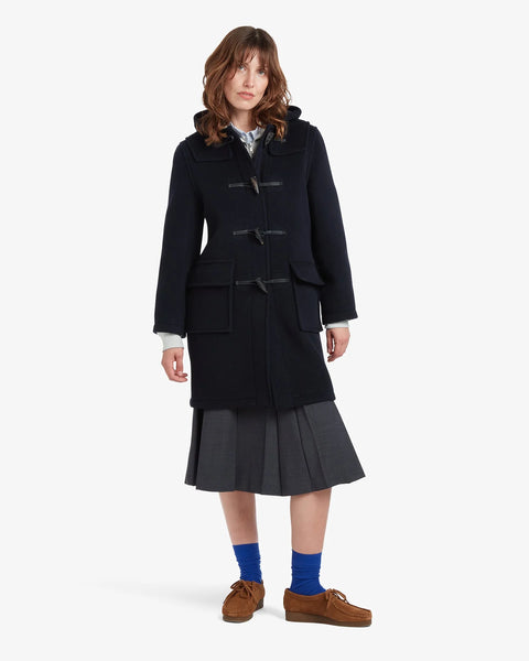 Ladies Gloverall Freda Duffle Coat in Navy Blackwatch - 80% Wool, 20% polyamide oversized coat with tartan lining - on model on a white background