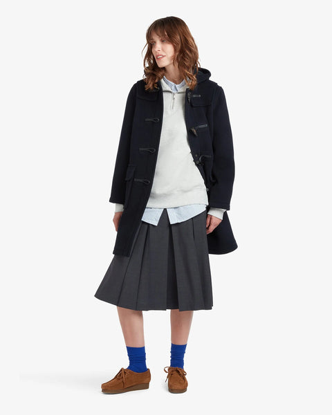 Ladies Gloverall Freda Duffle Coat in Navy Blackwatch - 80% Wool, 20% polyamide oversized coat with tartan lining - on model with coat open on a white background