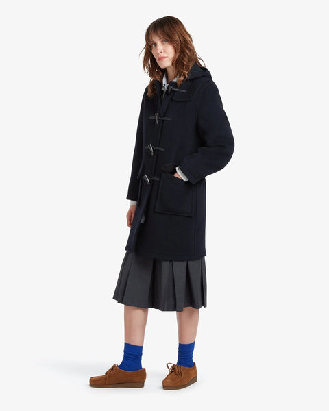 Ladies Gloverall Freda Duffle Coat in Navy Blackwatch - 80% Wool, 20% polyamide oversized coat with tartan lining - side view of coat on model on a white background