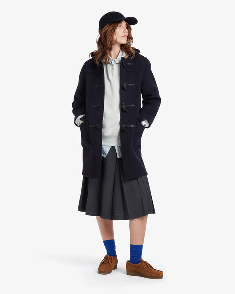 Ladies Gloverall Freda Duffle Coat in Navy Blackwatch - 80% Wool, 20% polyamide oversized coat with tartan lining - on model with coat open, on a white background