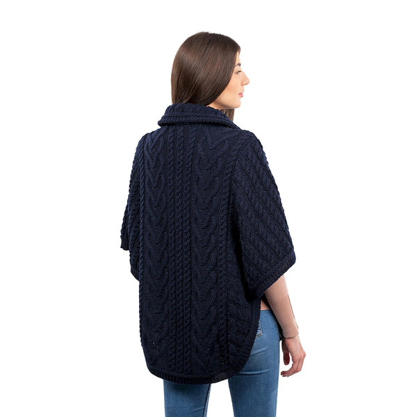 Funnel Neck Poncho in Navy - back view, on model