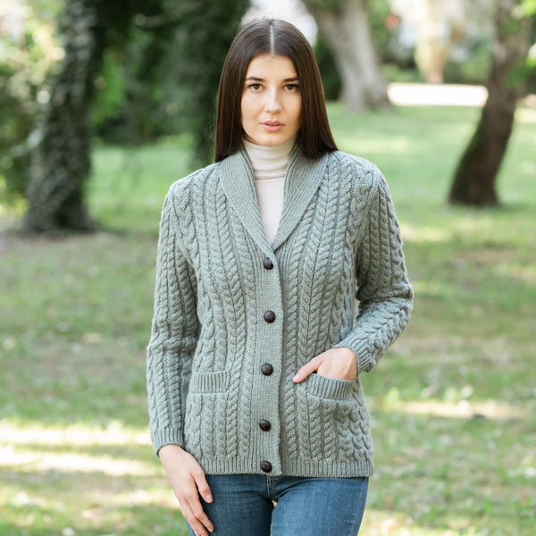Ladies Shawl Neck Cardigan in Skylight- 100% Merino wool cable knit cardigan with buttons, on model