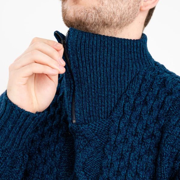 Men's Wool Half-Zip Sweater in Ocean Blue - close up of zip detail, on model