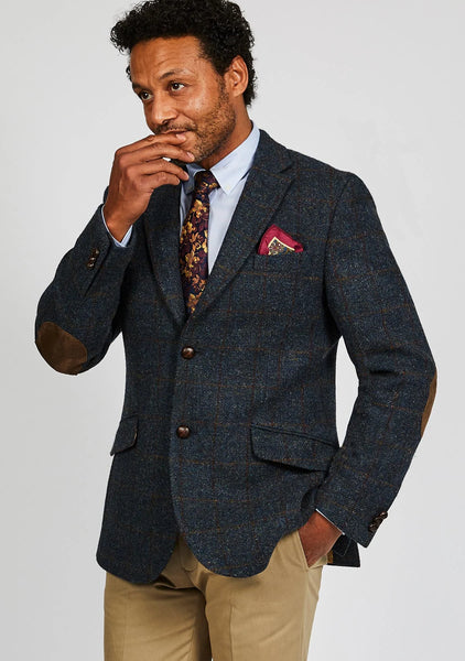Model wearing the blue multi check Harris Tweed Patrick Jacket