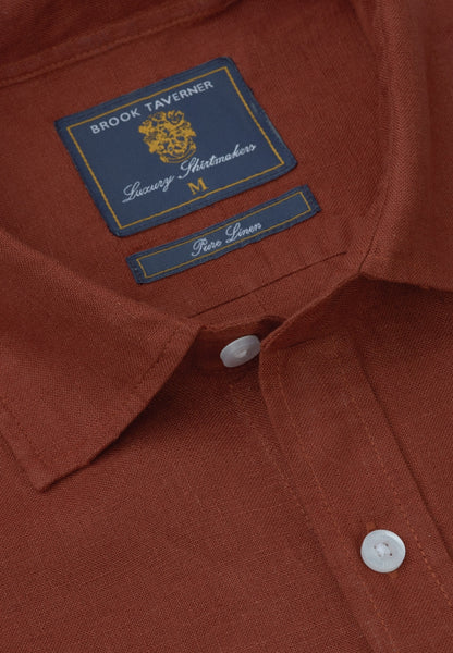 A close-up view of the neckline of the Regular Fit Rust Pure Linen Shirt.