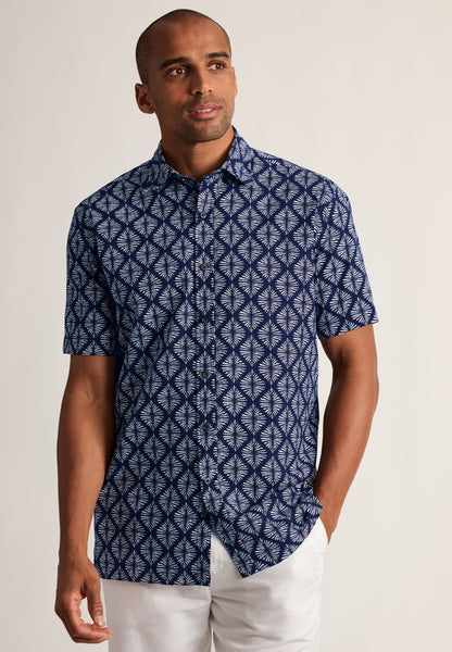 Male model wearing the Regular Fit Navy Geometric Print Seersucker Short Sleeve Shirt