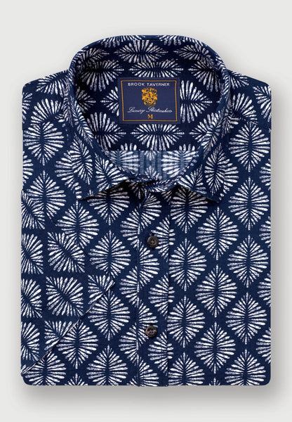 Up close view of the folded Regular Fit Navy Geometric Print Seersucker Short Sleeve Shirt