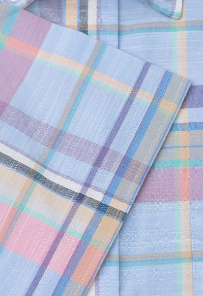 A close up view of the edge of sleeve and fabric of the Regular Fit Sky Blue Check Slub Cotton Short Sleeve Shirt.