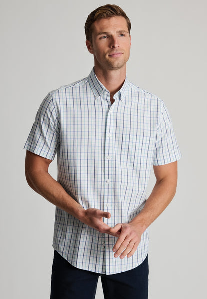 Male model wearing a Tattersall Oxford Short Sleeved Shirt in Mint Colouring