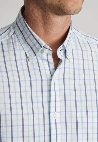 Male model wearing a Tattersall Oxford Short Sleeved Shirt in Mint Colouring and a close up view of the neckline
