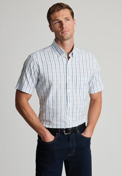 Male model wearing a Tattersall Oxford Short Sleeved Shirt in Mint Colouring