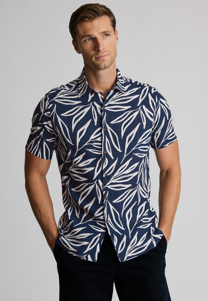 Male model wearing Cotton Linen Navy floral shirt