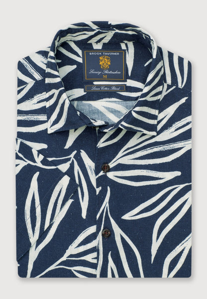Picture of folded Cotton Linen Navy floral shirt showing short sleeve and neckline