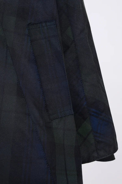Ladies Dublin Tartan Wax Hooded Cape in Blackwatch Tartan - close up on tartan and pocket details, on white background