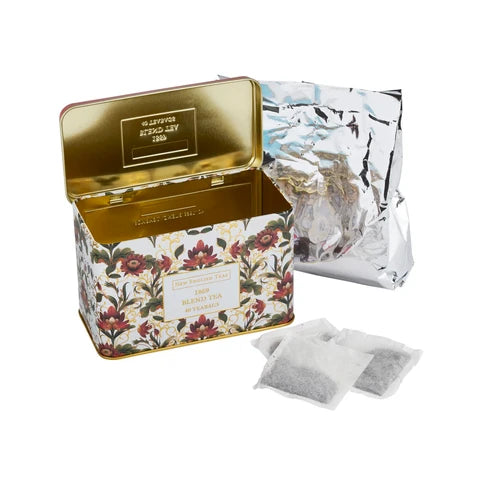 The Embroidery Collection Lotus Flower Tea Tin - Open Top showing tea bags and packaging