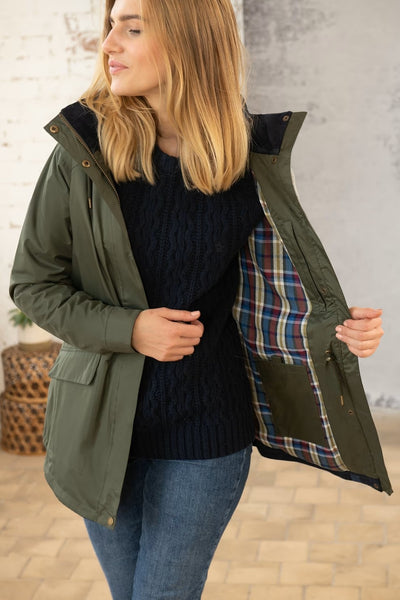 Kendal Raincoat on Model in colour Forest Green
