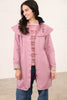 Ladies Lighthouse Outrider Coat in wild rose colour worn by model