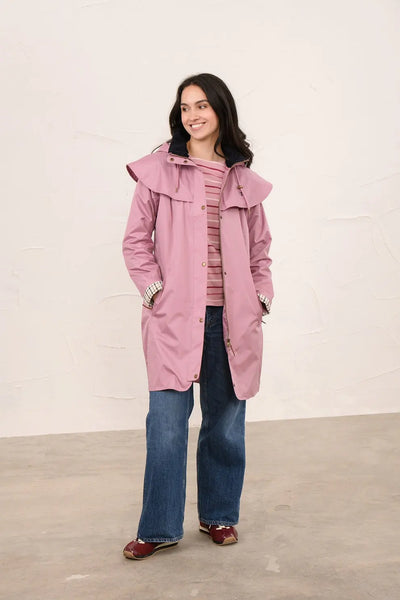 Ladies Outrider Jacket in Wild Rose worn by model with blue jeans.